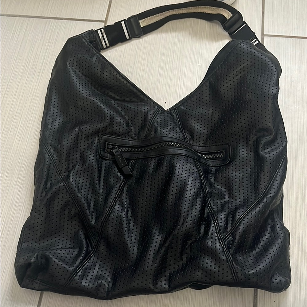 Black Hobo Bag with Textured Leather and Adjustable Strap